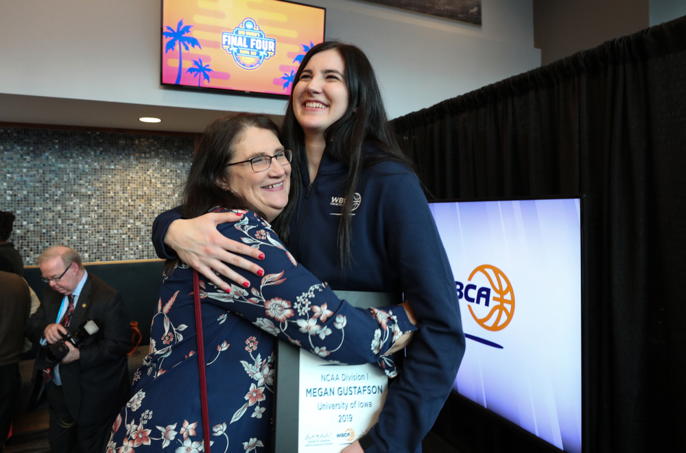Iowa Hawkeyes forward Megan Gustafson (10) and her mother Eva Wednesday, April 4, 2018 at Amalie Arena in Tampa, FL. (Brian Ray/hawkeyesports.com)