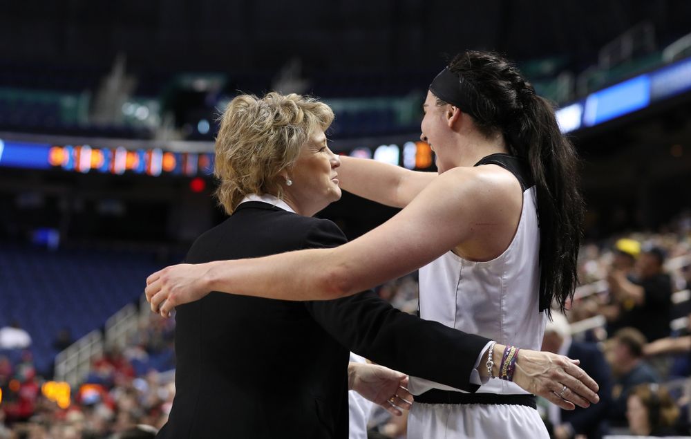Iowa Hawkeyes head coach Lisa Bluder and forward Megan Gustafson (10) against the NC State Wolfpack in the regional semi-final of the 2019 NCAA Women's College Basketball Tournament Saturday, March 30, 2019 at Greensboro Coliseum in Greensboro, NC.(Brian Ray/hawkeyesports.com)