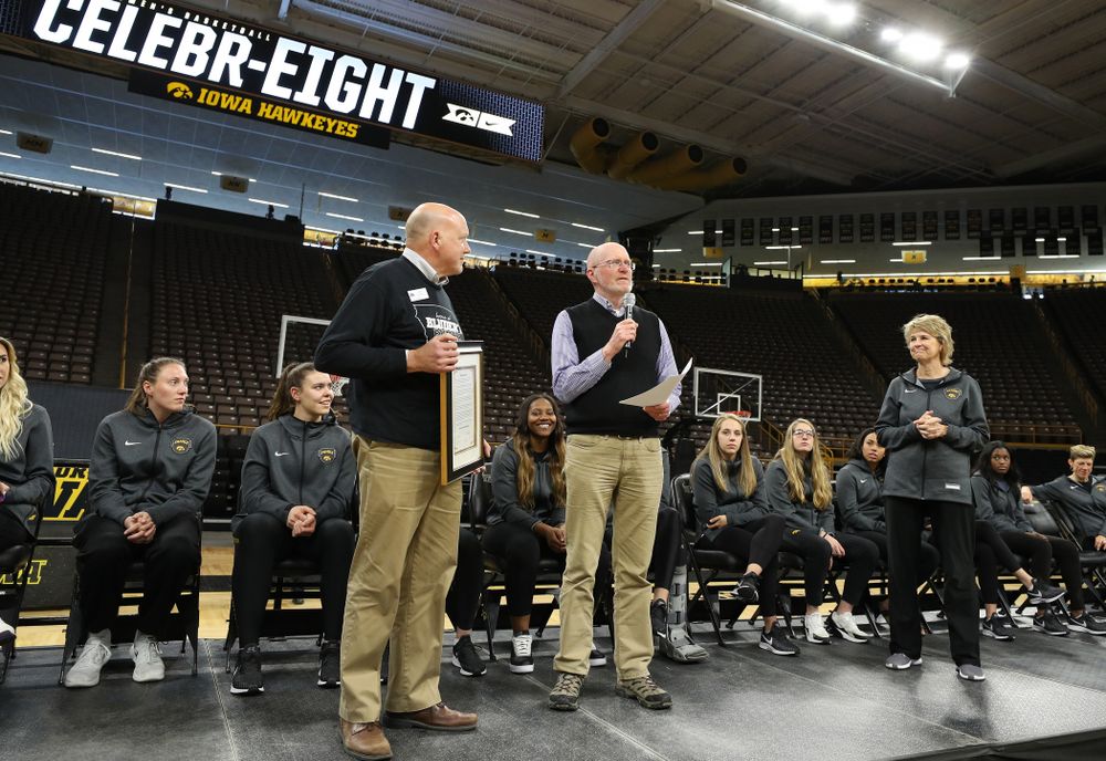 Iowa City Mayor Jim Throgmorton and Coralville Mayor John Lundell present Iowa Hawkeyes head coach Lisa Bluder with a joint proclamation designating April 24, 2019 as Iowa WomenÕs Basketball Day during the teamÕs Celebr-Eight event Wednesday, April 24, 2019 at Carver-Hawkeye Arena. (Brian Ray/hawkeyesports.com)