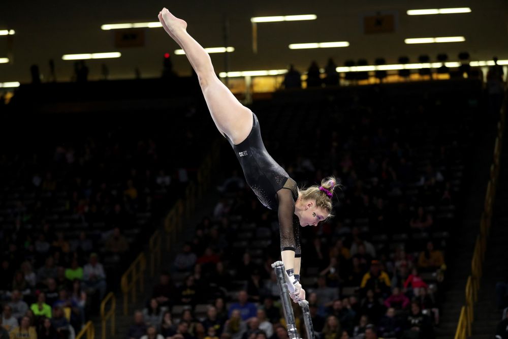 Iowa’s Allyson Steffensmeier competes on the bars against Michigan Friday, February 14, 2020 at Carver-Hawkeye Arena. (Brian Ray/hawkeyesports.com)