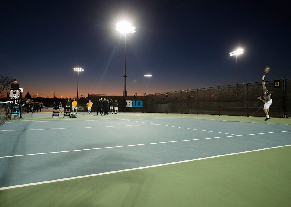Iowa's Jonas Larsen serves during his match again Michigan State at the Hawkeye Tennis and Recreation Complex in Iowa City on Friday, Apr. 19, 2019. (Stephen Mally/hawkeyesports.com)