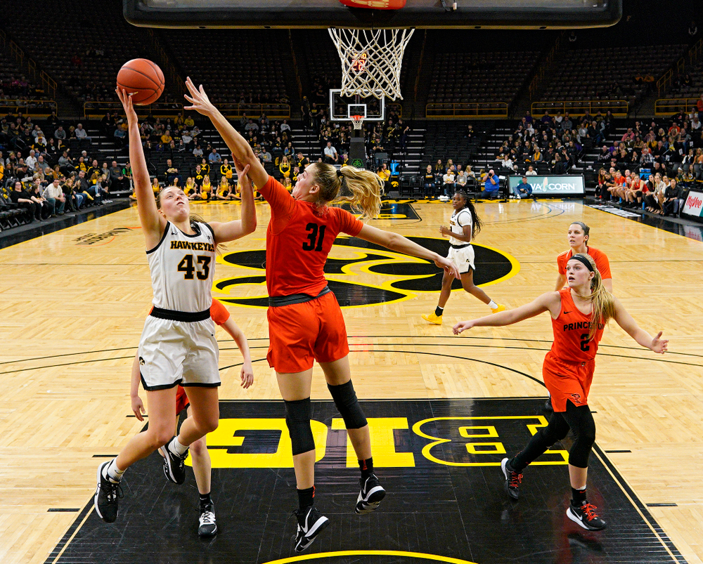 Iowa forward Amanda Ollinger (43) scores a basket during the third quarter of their overtime win against Princeton at Carver-Hawkeye Arena in Iowa City on Wednesday, Nov 20, 2019. (Stephen Mally/hawkeyesports.com)