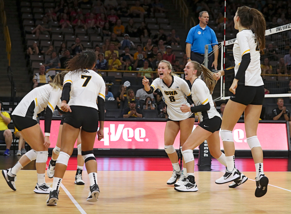 Iowa’s Kyndra Hansen (8) points at Brie Orr (7) after her kill with an assist by Orr during the third set of their Big Ten/Pac-12 Challenge match against Colorado at Carver-Hawkeye Arena in Iowa City on Friday, Sep 6, 2019. (Stephen Mally/hawkeyesports.com)