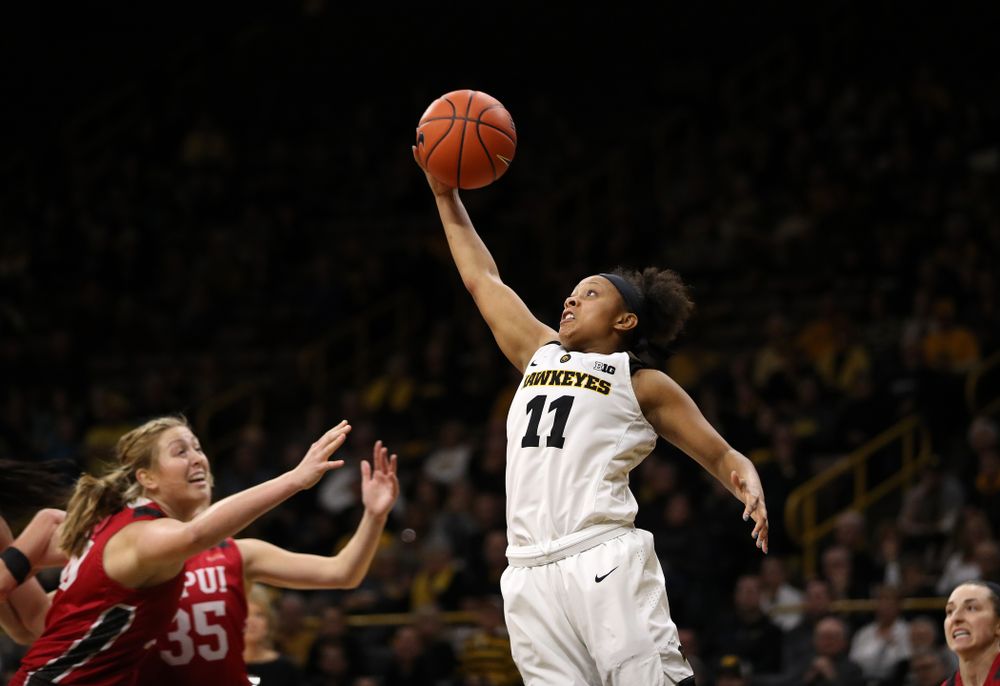 Iowa Hawkeyes guard Tania Davis (11) against the IUPUI Jaguars Saturday, December 8, 2018 at Carver-Hawkeye Arena. (Brian Ray/hawkeyesports.com)