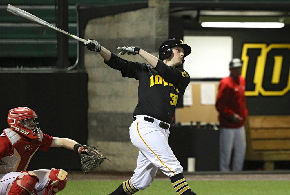 Iowa designated hitter Trenton Wallace (38) hits a home run during the eighth inning of their game at Duane Banks Field in Iowa City on Tuesday, March 3, 2020. (Stephen Mally/hawkeyesports.com)