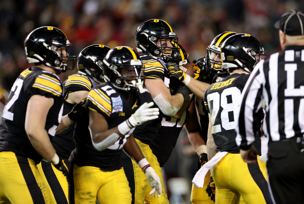 Iowa Hawkeyes linebacker Kristian Welch (34) celebrates after recovering a fumble against USC in the Holiday Bowl Friday, December 27, 2019 at San Diego Community Credit Union Stadium. (Brian Ray/hawkeyesports.com)