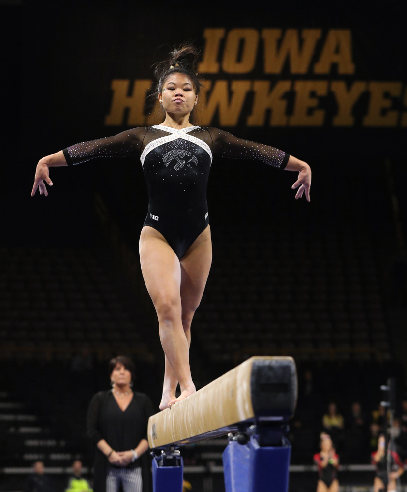 Iowa's Misty-Jade Carlson competes on the beam against the Rutgers Scarlet Knights Saturday, January 26, 2019 at Carver-Hawkeye Arena. (Brian Ray/hawkeyesports.com)