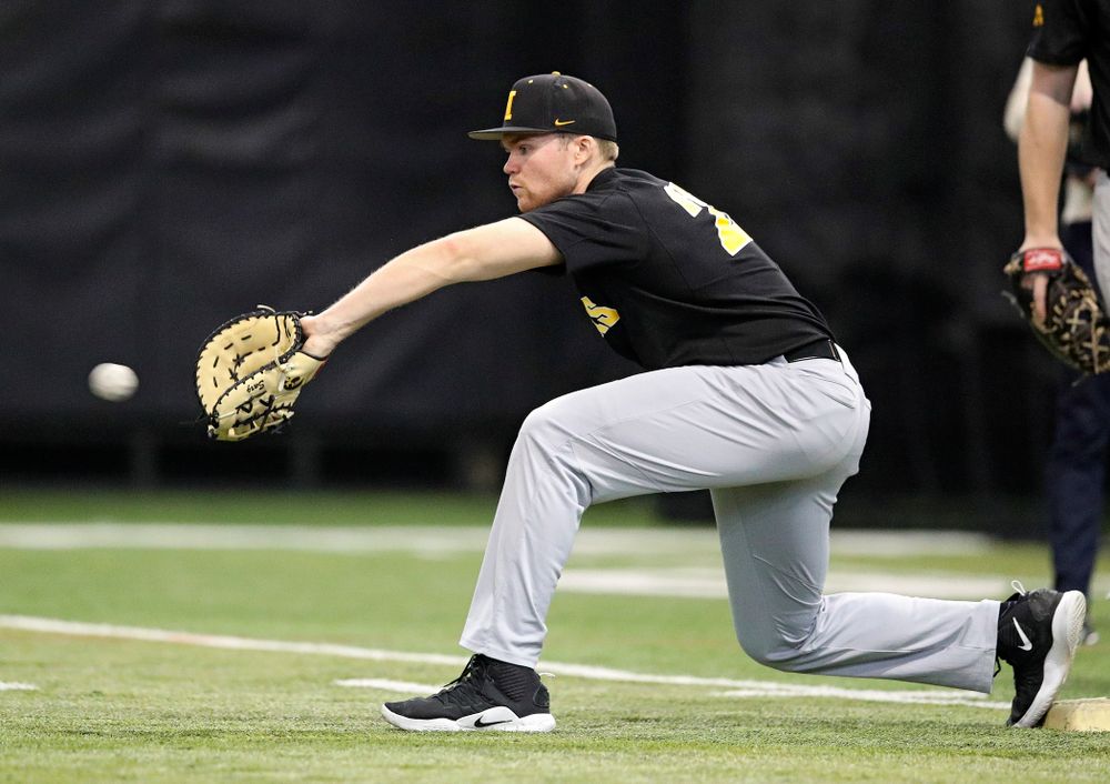 Iowa Hawkeyes first baseman Tanner Padgett (22) pulls in a throw during practice at the Hansen Football Performance Center in Iowa City on Friday, January 24, 2020. (Stephen Mally/hawkeyesports.com)