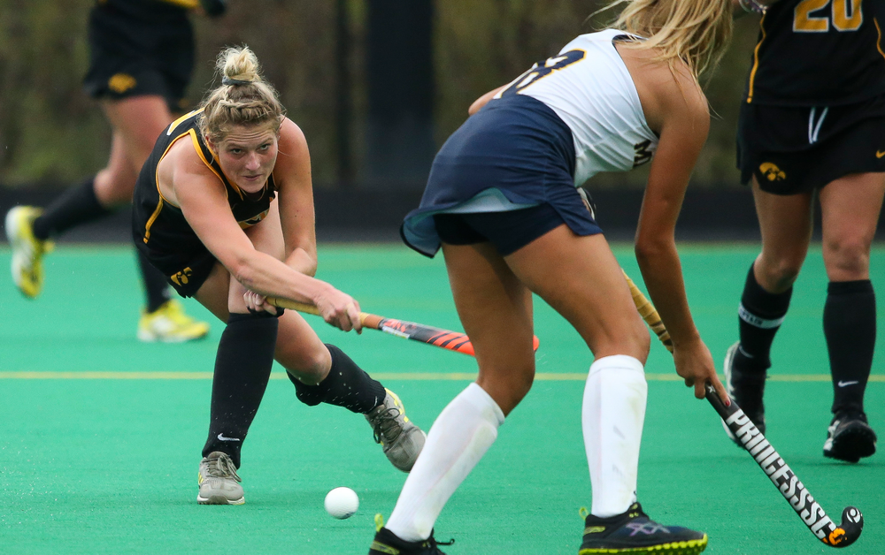 Iowa Hawkeyes midfielder Ellie Holley (7) passes the ball during a game against Michigan at Grant Field on October 5, 2018. (Tork Mason/hawkeyesports.com)