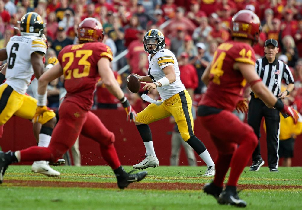 Iowa Hawkeyes quarterback Nate Stanley (4) scrables during the second quarter of their Iowa Corn Cy-Hawk Series game at Jack Trice Stadium in Ames on Saturday, Sep 14, 2019. (Stephen Mally/hawkeyesports.com)