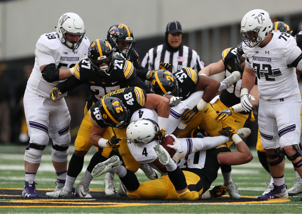 Iowa Hawkeyes linebacker Jack Hockaday (48), linebacker Djimon Colbert (32), and defensive end Parker Hesse (40) against the Northwestern Wildcats Saturday, November 10, 2018 at Kinnick Stadium. (Brian Ray/hawkeyesports.com)