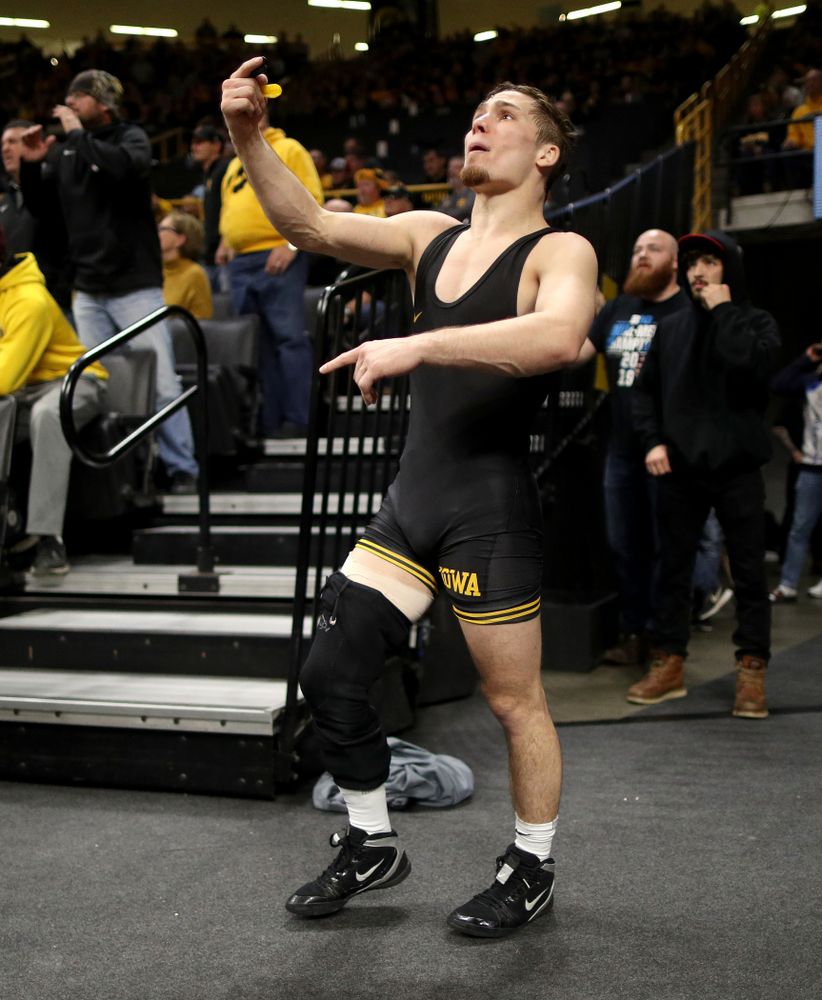 IowaÕs Spencer Lee cheers on teammate Austin DeSanto as he wrestles WisconsinÕs Seth Gross at 133 pounds Sunday, December 1, 2019 at Carver-Hawkeye Arena. DeSanto won the match 6-2. (Brian Ray/hawkeyesports.com)