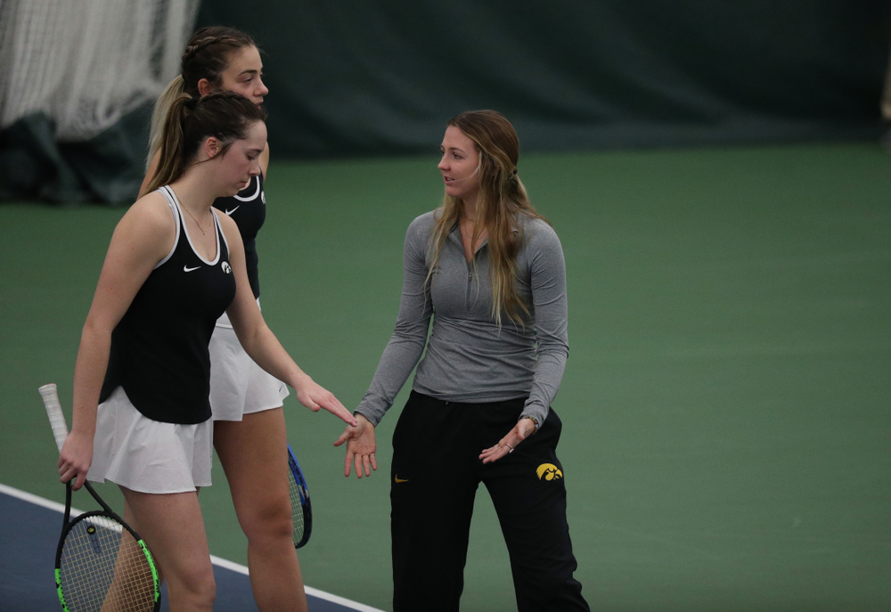 Iowa's Sophie Clark and Sam Mannix during a doubles match against North Texas Sunday, January 20, 2019 at the Hawkeye Tennis and Recreation Center. (Brian Ray/hawkeyesports.com)