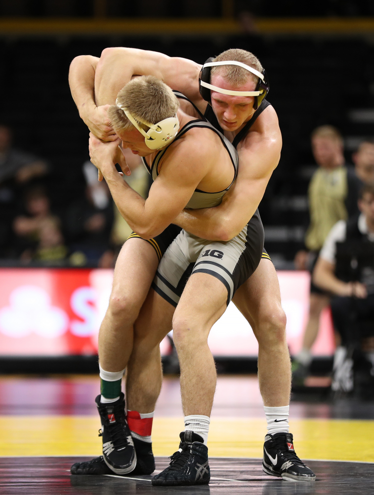 Iowa's Kaleb Young wrestles Purdue's Griffin Parriott at 157 pounds Saturday, November 24, 2018 at Carver-Hawkeye Arena. (Brian Ray/hawkeyesports.com)