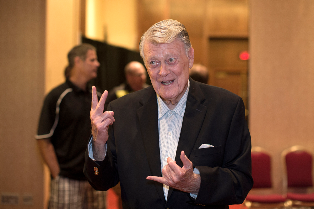 Former Hawkeye Football Head Coach Hayden Fry tells a story before a panel discussion with former quarterback Chuck Long during a panel discussion at Fry Fest Friday, Aug. 29, 2014 in Coralville. (Brian Ray/hawkeyesports.com)