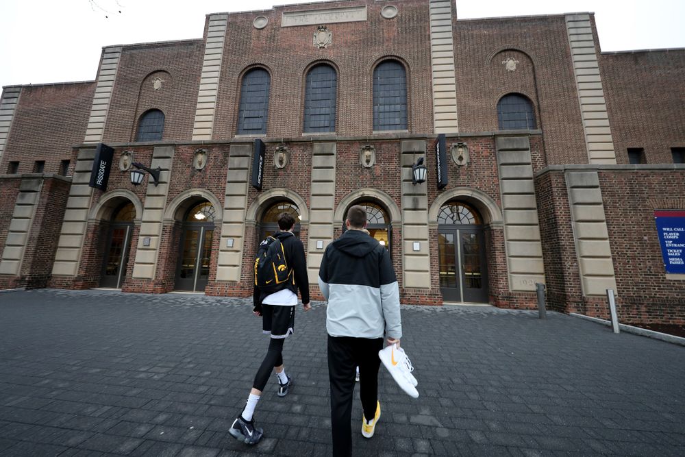 Iowa Hawkeyes forward Patrick McCaffery (22), and guard Connor McCaffery (30) arrive for practice at the Palestra Friday, January 3, 2020 in Philadelphia. (Brian Ray/hawkeyesports.com)