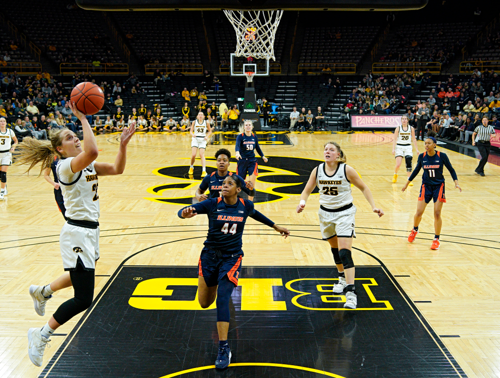 Iowa Hawkeyes guard Kathleen Doyle (22) takes a pass and scores during the fourth quarter of their game at Carver-Hawkeye Arena in Iowa City on Tuesday, December 31, 2019. (Stephen Mally/hawkeyesports.com)