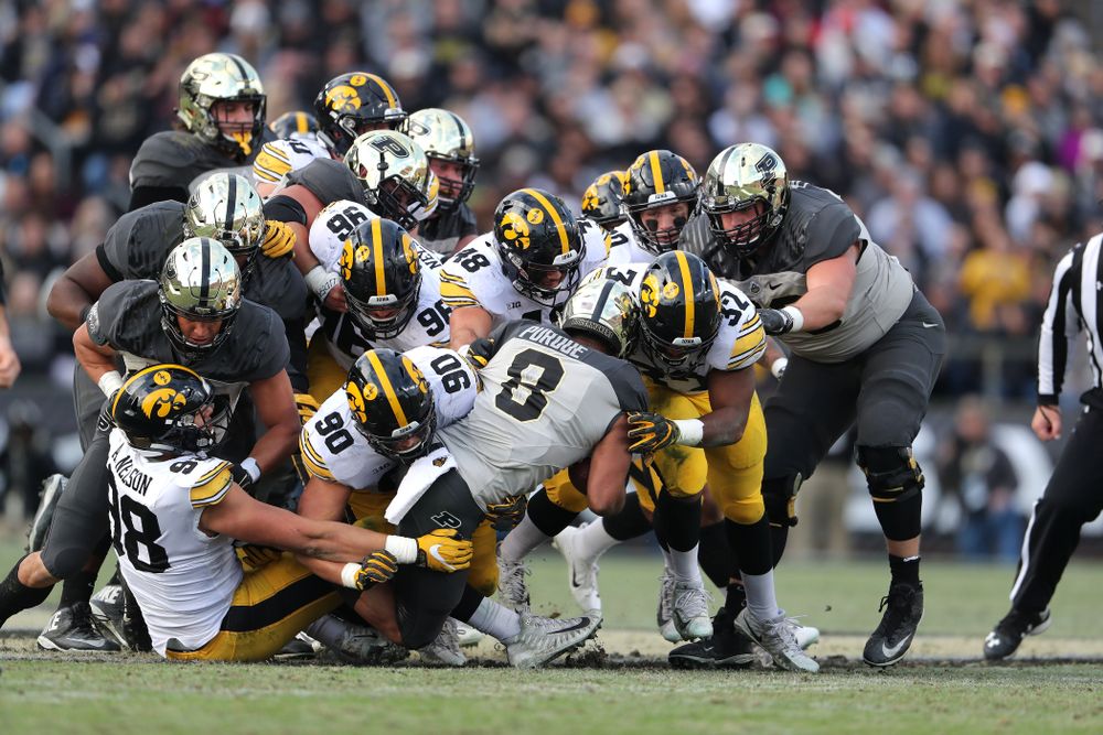 Iowa Hawkeyes linebacker Djimon Colbert (32), linebacker Jack Hockaday (48), and defensive end Sam Brincks (90) against the Purdue Boilermakers Saturday, November 3, 2018 Ross Ade Stadium in West Lafayette, Ind. (Brian Ray/hawkeyesports.com)