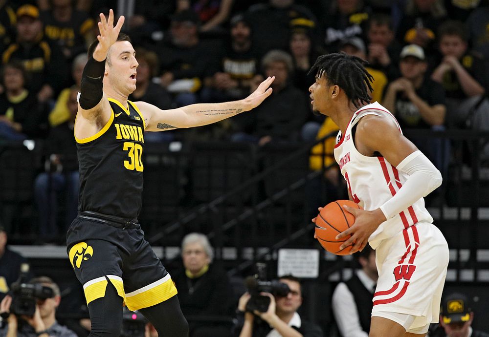 Iowa Hawkeyes guard Connor McCaffery (30) defends during the first half of their game at Carver-Hawkeye Arena in Iowa City on Monday, January 27, 2020. (Stephen Mally/hawkeyesports.com)