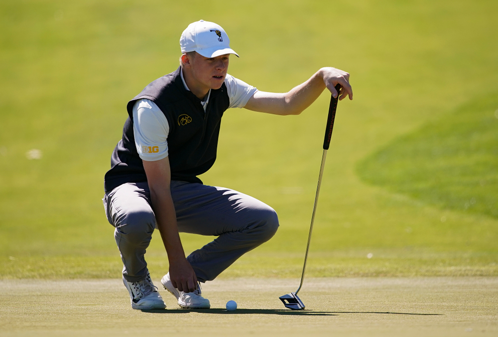 Iowa's Benton Weinberg lines up a putt during the first round of the Hawkeye Invitational at Finkbine Golf Course in Iowa City on Saturday, Apr. 20, 2019. (Stephen Mally/hawkeyesports.com)