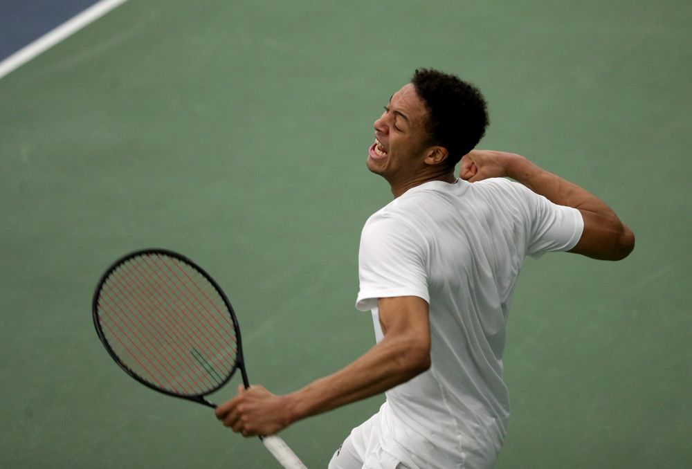 Iowa’s Oliver Okonkwo against Cornell Sunday, March 8, 2020 at the Hawkeye Tennis and Recreation Center. (Brian Ray/hawkeyesports.com)