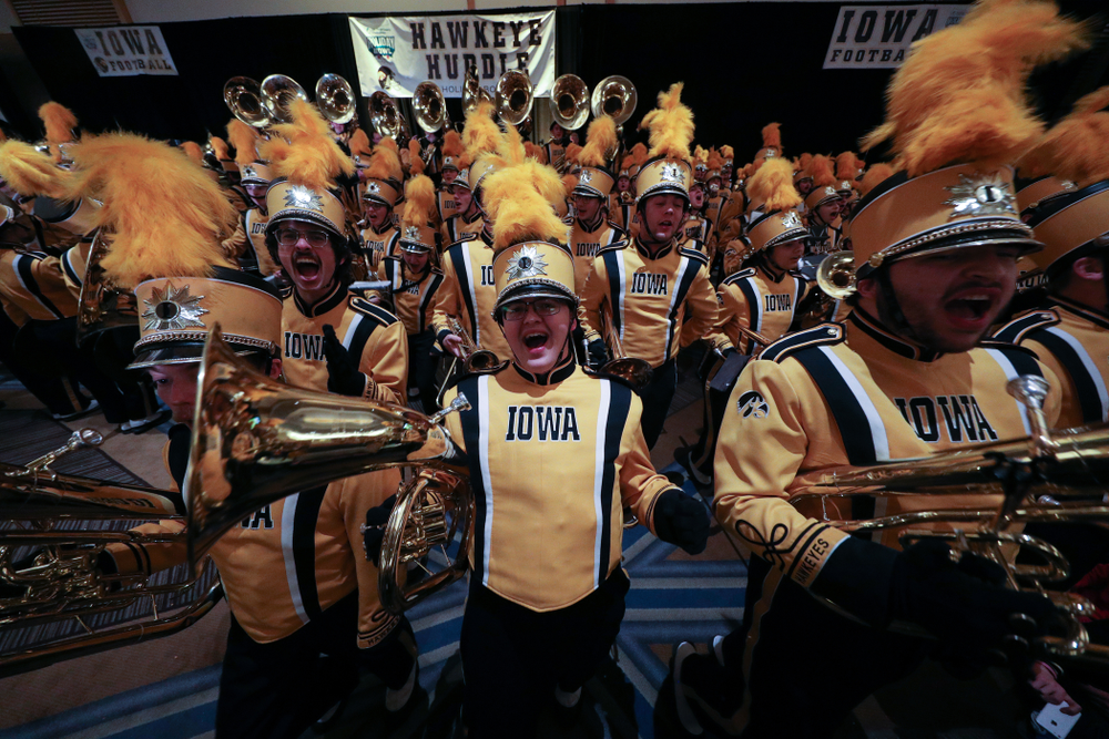 The Hawkeye Marching Band and the Iowa Spirit Squads perform during the Holiday Bowl Hawkeye Huddle Thursday, December 26, 2019 at the Hilton in downtown San Diego. (Brian Ray/hawkeyesports.com)
