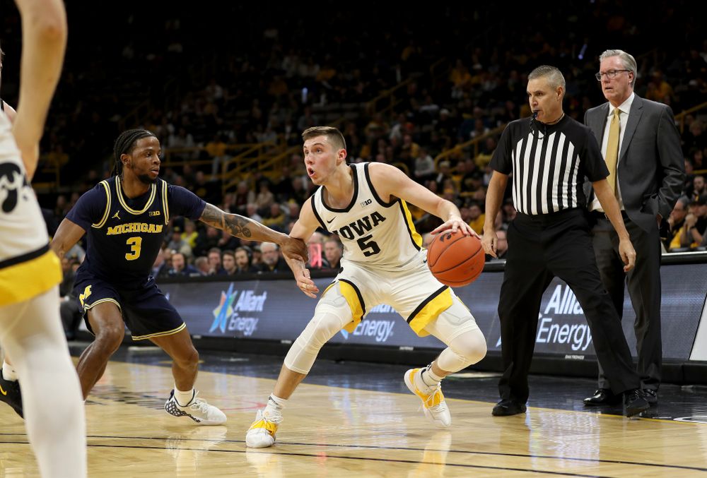Iowa Hawkeyes guard CJ Fredrick (5) against the Michigan Wolverines Friday, January 17, 2020 at Carver-Hawkeye Arena. (Brian Ray/hawkeyesports.com)