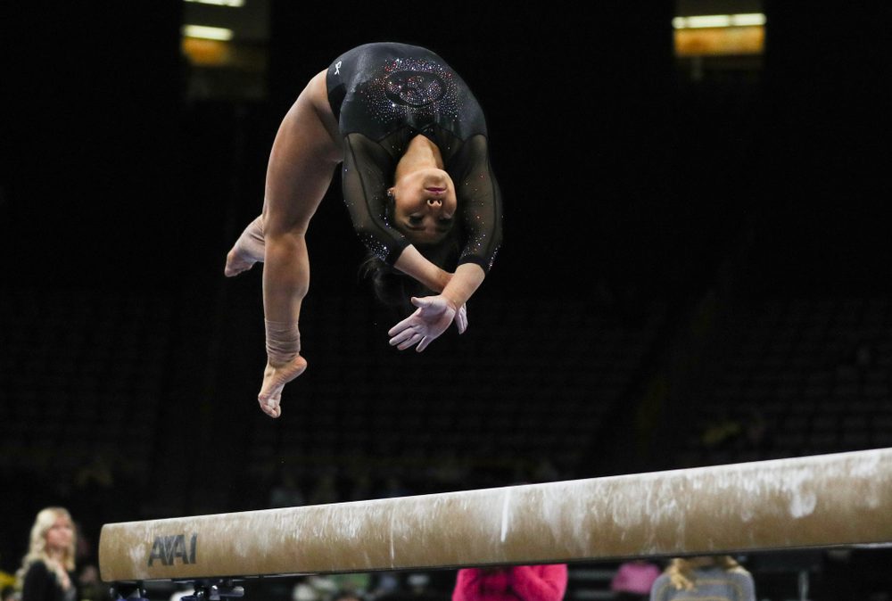 Iowa’s Claire Kaji competes on the beam against Michigan Friday, February 14, 2020 at Carver-Hawkeye Arena. (Brian Ray/hawkeyesports.com)