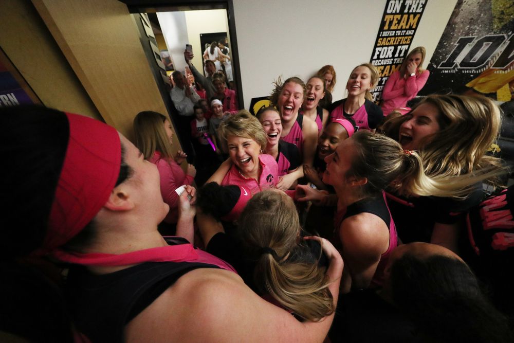 The Iowa Hawkeyes celebrate with head coach Lisa Bluder following their win over the seventh ranked Maryland Terrapins Sunday, February 17, 2019 at Carver-Hawkeye Arena. (Brian Ray/hawkeyesports.com)