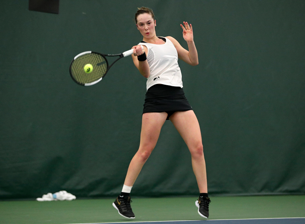 Iowa’s Samantha Mannix returns a shot during her singles match at the Hawkeye Tennis and Recreation Complex in Iowa City on Sunday, February 23, 2020. (Stephen Mally/hawkeyesports.com)