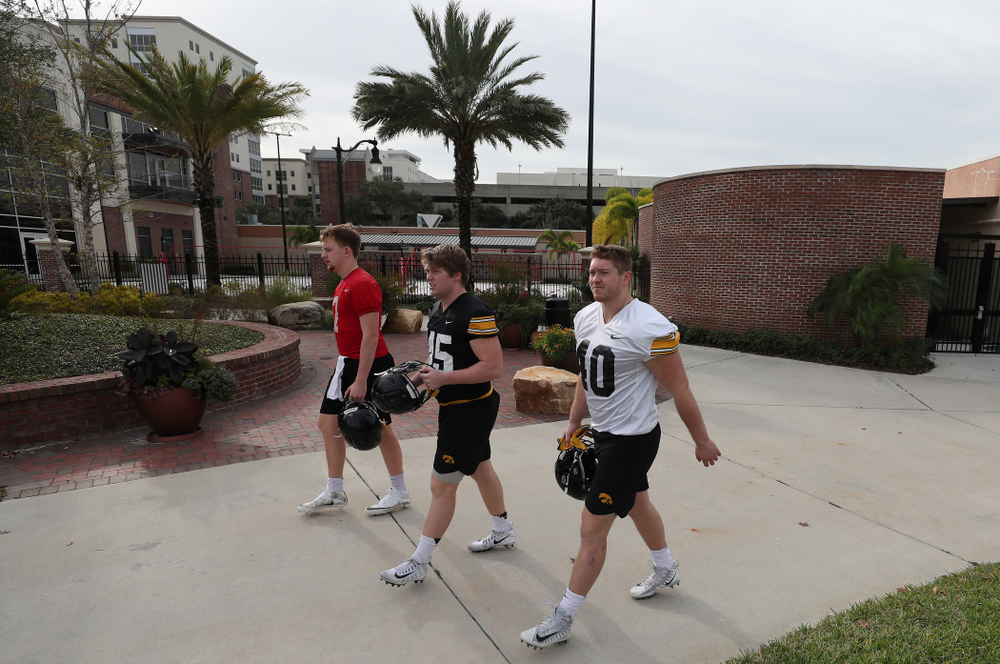Iowa Hawkeyes defensive end Parker Hesse (40), fullback Joe Ludwig (45), and quarterback Spencer Petras (7) during the team's first Outback Bowl Practice in Florida Thursday, December 27, 2018 at Tampa University. (Brian Ray/hawkeyesports.com)