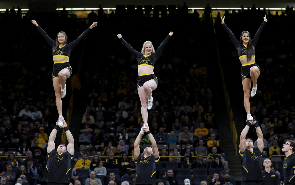 The Iowa Cheerleaders and Dance Team perform on senior night at half-time of the Iowa Hawkeyes game against the Purdue Boilermakers Tuesday, March 3, 2020 at Carver-Hawkeye Arena. (Brian Ray/hawkeyesports.com)