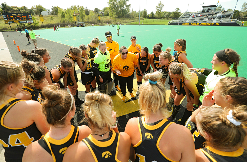 Iowa head coach Lisa Cellucci talks with her team before the start of their match at Grant Field in Iowa City on Friday, Oct 4, 2019. (Stephen Mally/hawkeyesports.com)