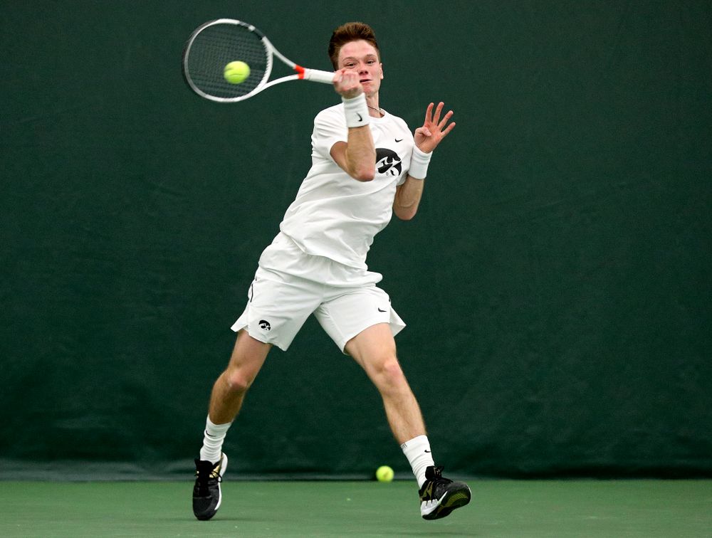 Iowa’s Jason Kerst returns a shot during his singles match at the Hawkeye Tennis and Recreation Complex in Iowa City on Sunday, February 16, 2020. (Stephen Mally/hawkeyesports.com)