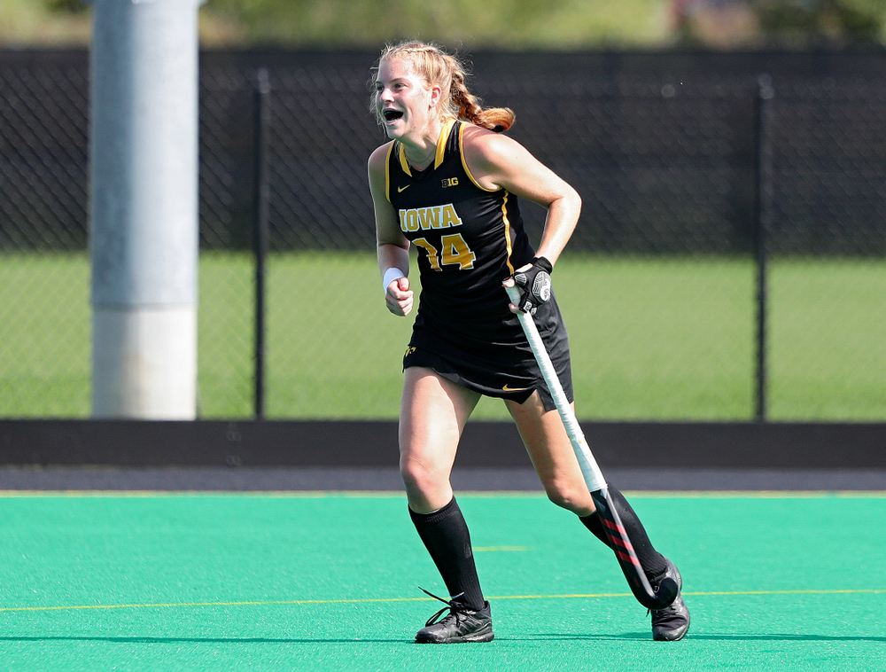 Iowa’s Lokke Stribos (14) celebrates after scoring a goal during the first quarter of their match at Grant Field in Iowa City on Friday, Oct 4, 2019. (Stephen Mally/hawkeyesports.com)
