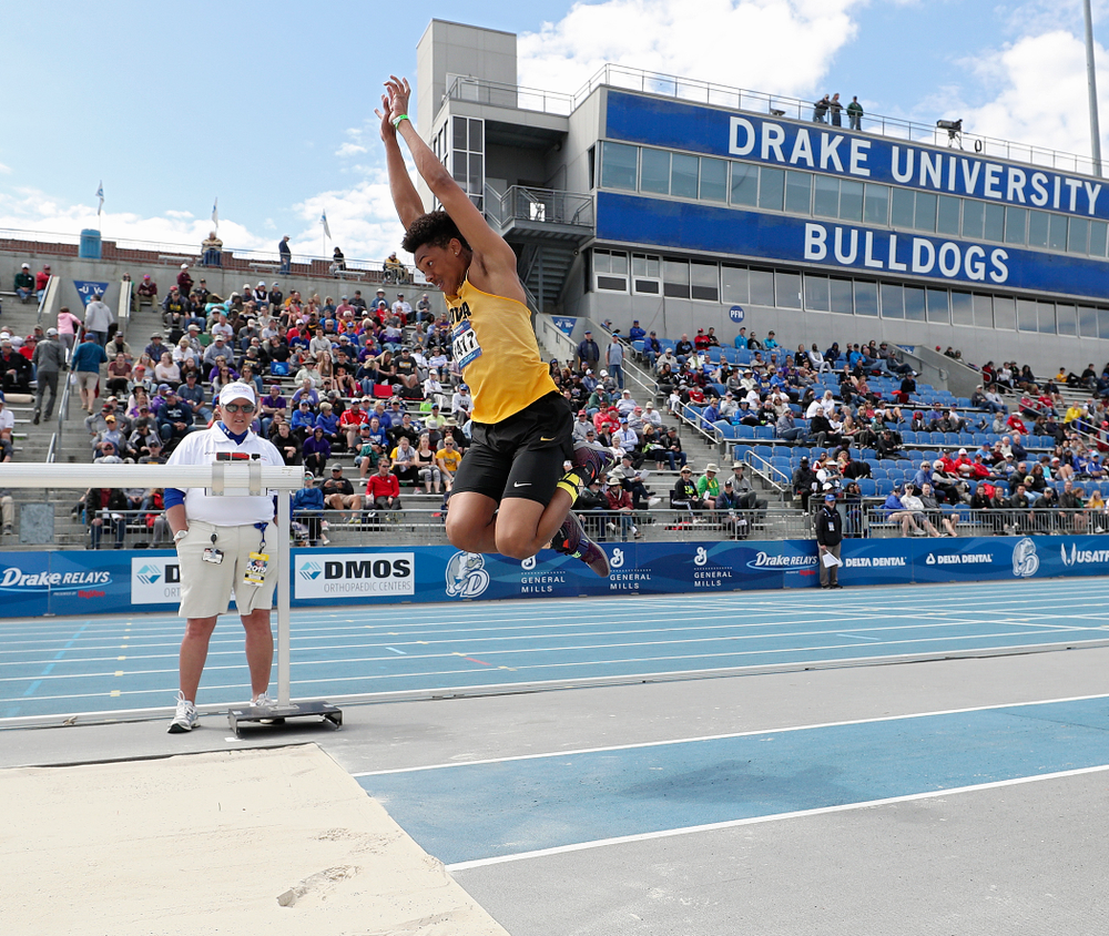 Iowa's James Carter makes a jump in the men's triple jump event during the second day of the Drake Relays at Drake Stadium in Des Moines on Friday, Apr. 26, 2019. (Stephen Mally/hawkeyesports.com)