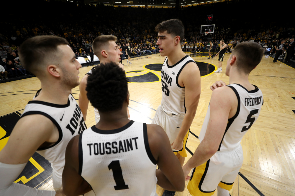 Iowa Hawkeyes forward Luka Garza (55), guard CJ Fredrick (5), guard Joe Toussaint (1), guard Connor McCaffery (30), and guard Joe Wieskamp (10) against the Purdue Boilermakers Tuesday, March 3, 2020 at Carver-Hawkeye Arena. (Brian Ray/hawkeyesports.com)