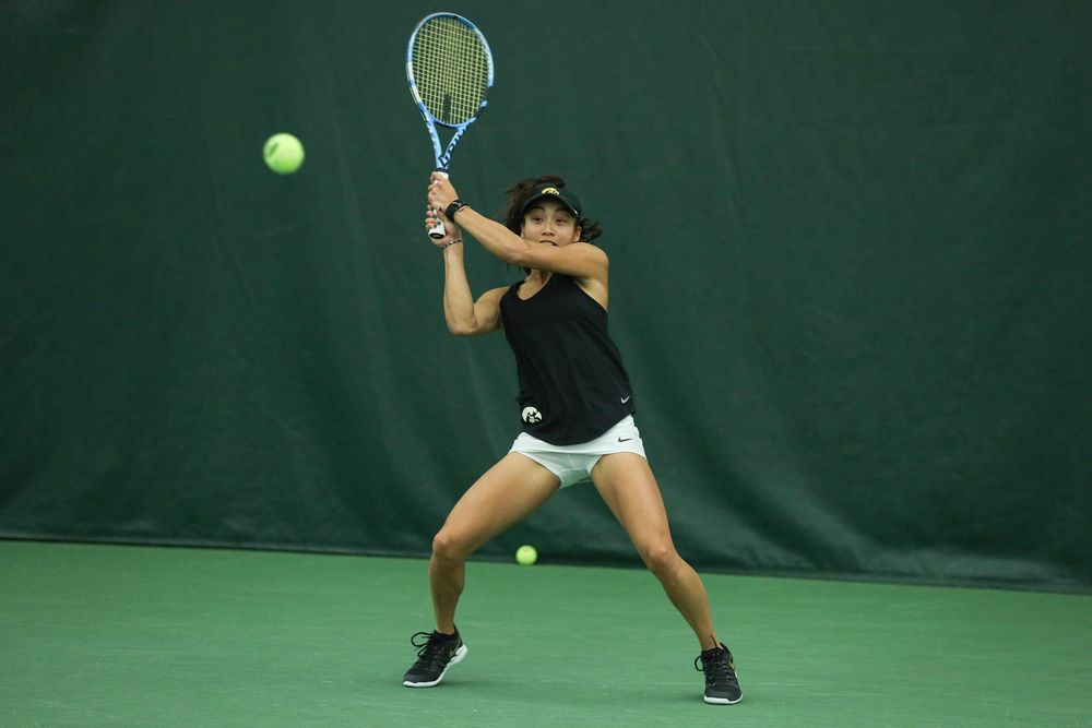 Iowa’s Michelle Bacalla returns a hit during the Iowa women’s tennis meet vs DePaul on Friday, February 21, 2020 at the Hawkeye Tennis and Recreation Complex. (Lily Smith/hawkeyesports.com)