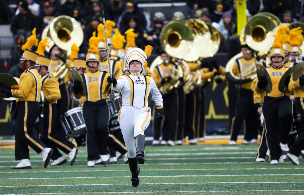 Hawkeye Marching Band drum major Analisa Iole marches onto the field before a game against Northwestern at Kinnick Stadium on November 10, 2018. (Tork Mason/hawkeyesports.com)