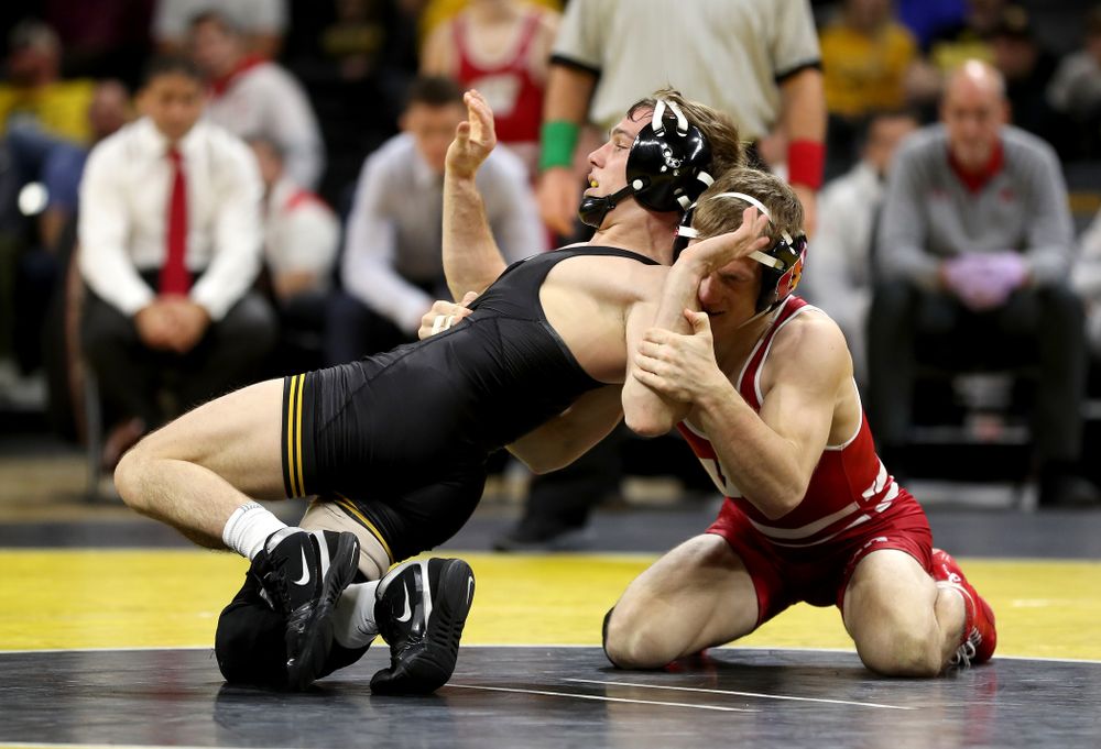IowaÕs Spencer Lee wrestles WisconsinÕs Michael Cullen at 125 pounds Sunday, December 1, 2019 at Carver-Hawkeye Arena. Lee won the match with a 16-0 technical fall. (Brian Ray/hawkeyesports.com)