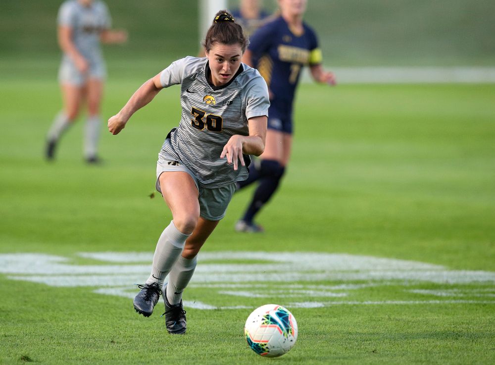 Iowa forward Devin Burns (30) moves with the ball during the first half of their match at the Iowa Soccer Complex in Iowa City on Friday, Sep 13, 2019. (Stephen Mally/hawkeyesports.com)