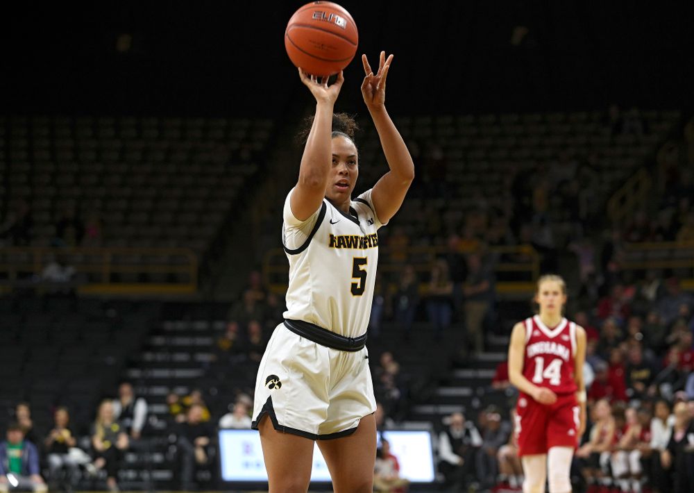 Iowa Hawkeyes guard Alexis Sevillian (5) makes a free throw during the second overtime period of their game at Carver-Hawkeye Arena in Iowa City on Sunday, January 12, 2020. (Stephen Mally/hawkeyesports.com)