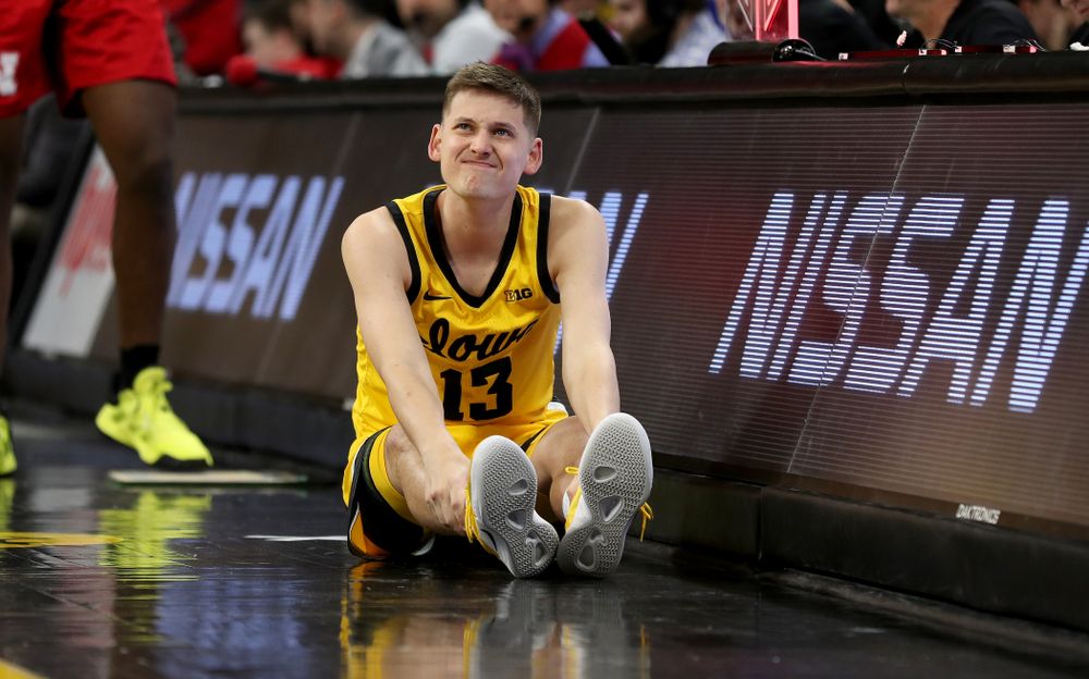 Iowa Hawkeyes guard Austin Ash (13) against the Nebraska Cornhuskers Saturday, February 8, 2020 at Carver-Hawkeye Arena. (Brian Ray/hawkeyesports.com)