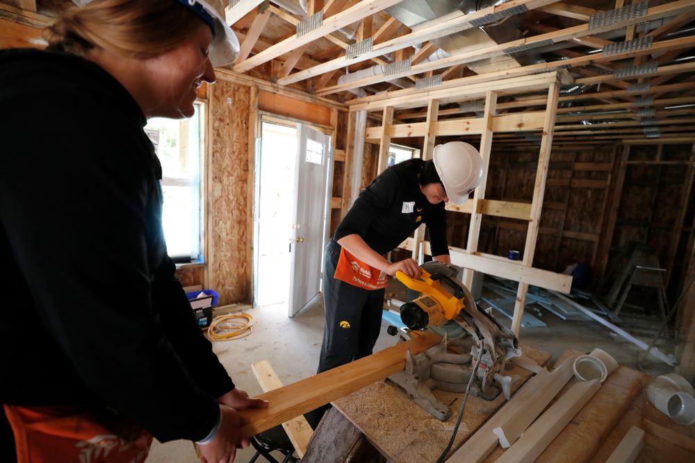 Iowa Hawkeyes forward Megan Gustafson (10) and Iowa Hawkeyes forward/center Monika Czinano (25) work on the Habitat for Humanity Women's Build Wednesday, September 26, 2018 in Iowa City. (Brian Ray/hawkeyesports.com)