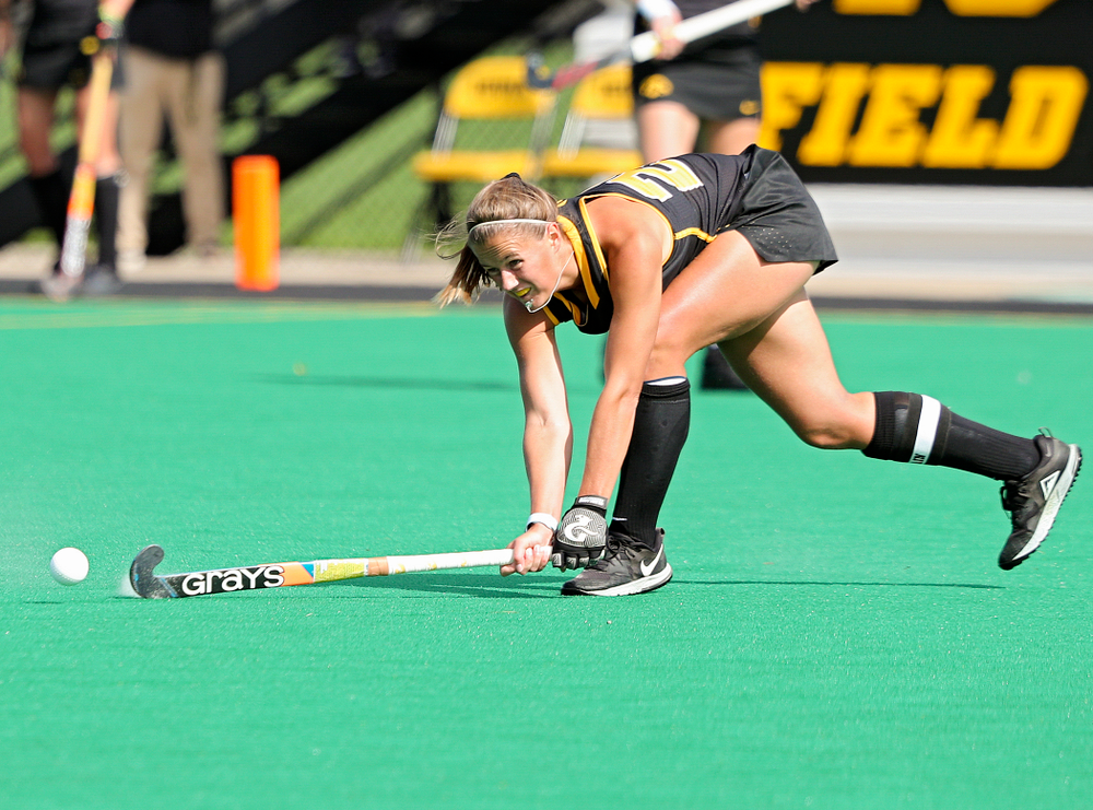 Iowa’s Sophie Sunderland (20) passes during the first quarter of their match at Grant Field in Iowa City on Friday, Oct 4, 2019. (Stephen Mally/hawkeyesports.com)