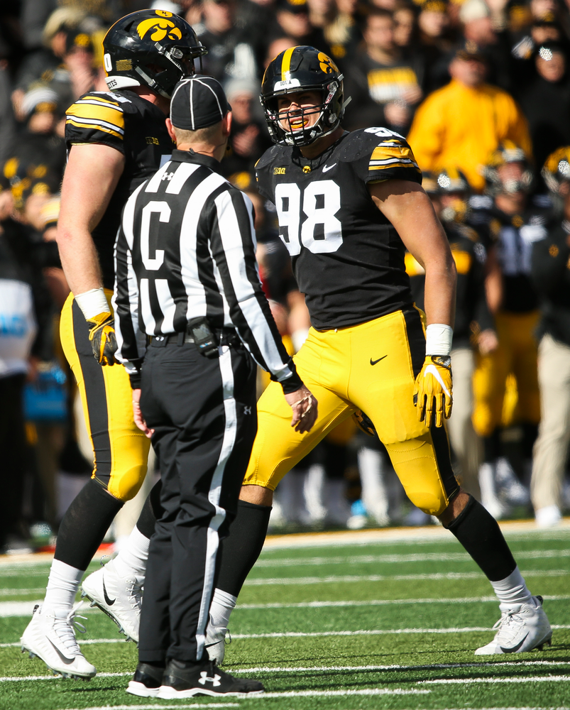 Iowa Hawkeyes defensive end Anthony Nelson (98) reacts after Iowa Hawkeyes defensive end Parker Hesse (40) sacks the quarterback during a game against Maryland at Kinnick Stadium on October 20, 2018. (Tork Mason/hawkeyesports.com)