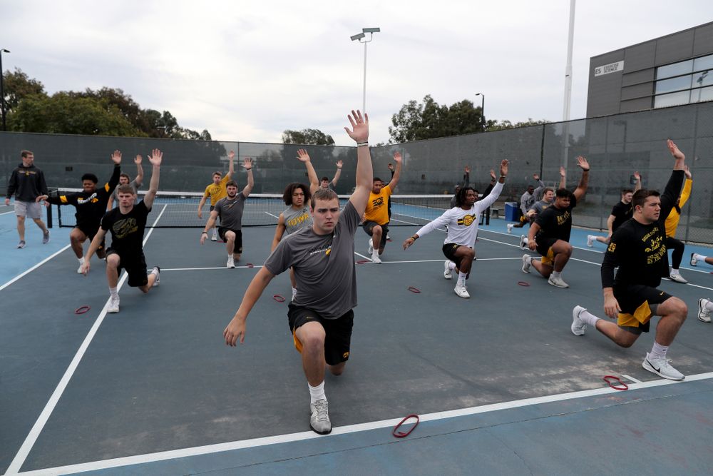 The Iowa Hawkeyes warm up for a lift before practice Sunday, December 22, 2019 at Mesa College in San Diego. (Brian Ray/hawkeyesports.com)