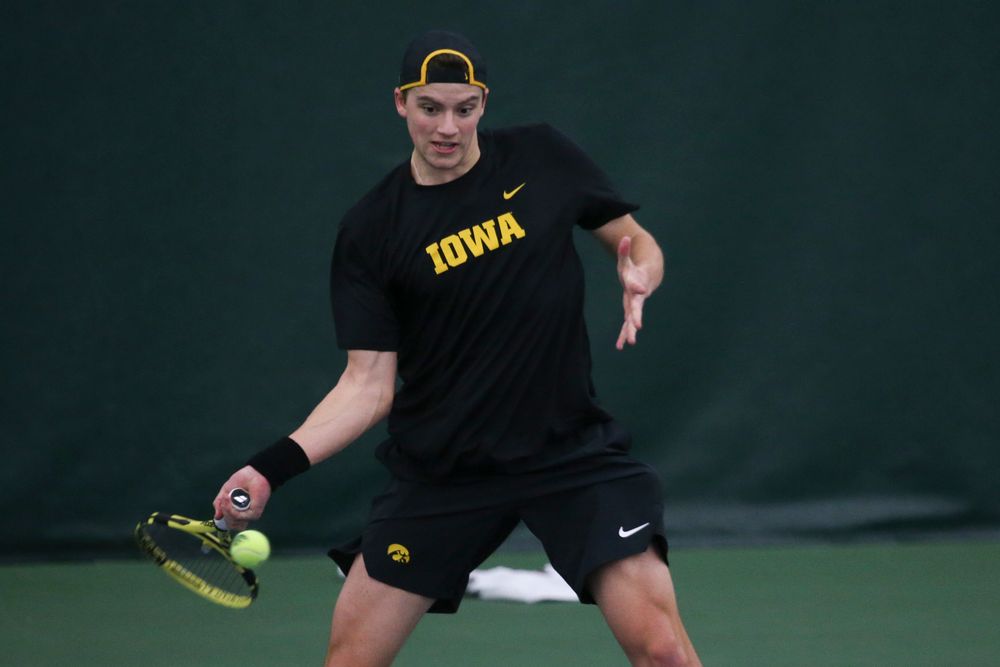 Iowa’s Joe Tyler returns a hit during the Iowa men’s tennis meet vs VCU on Saturday, February 29, 2020 at the Hawkeye Tennis and Recreation Complex. (Lily Smith/hawkeyesports.com)
