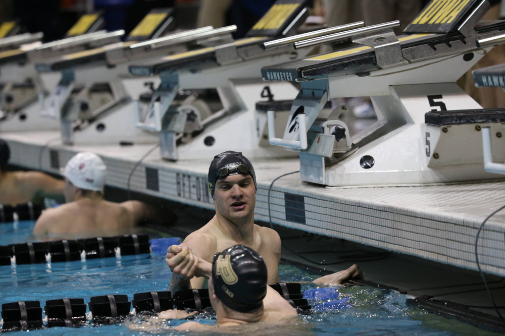 Iowa's Kenneth Mende at the 100-yard backstroke race Friday, March 1, 2019 at the Campus Recreation and Wellness Center. (Lily Smith/hawkeyesports.com)