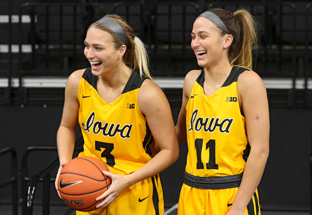 Iowa guard Makenzie Meyer (3) and guard Megan Meyer (11) laugh as they pose for a picture during Iowa Women’s Basketball Media Day at Carver-Hawkeye Arena in Iowa City on Thursday, Oct 24, 2019. (Stephen Mally/hawkeyesports.com)